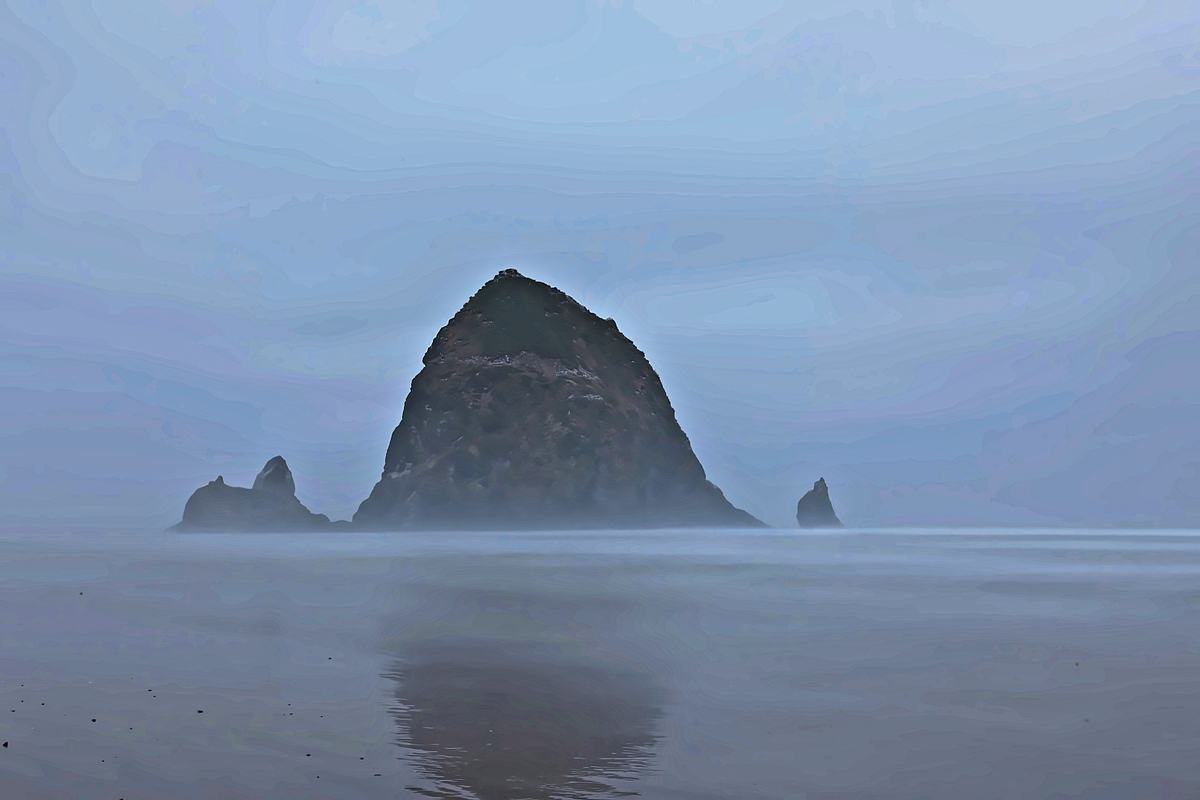 The Mirror. A photograph of Cannon Beach, Oregon.