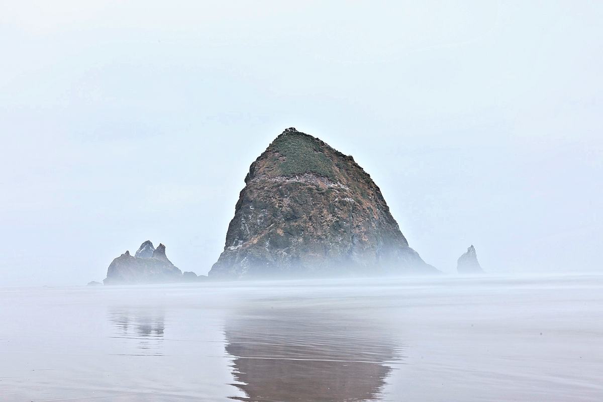 Haystack in the Fog. A photograph of Cannon Beach, Oregon.